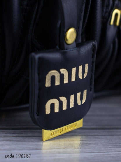 Miu Miu Matelassé Leather Top-Handle Bag