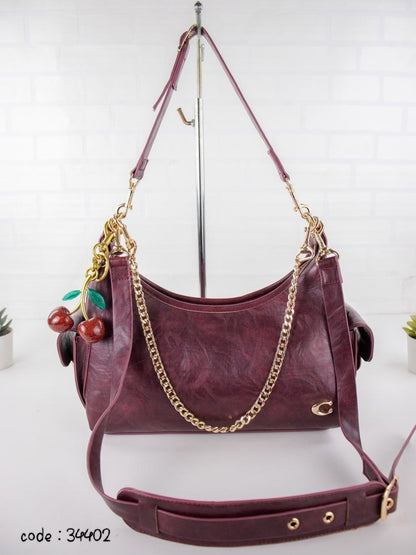 COACH Chic Slouchy Hobo Bag with Cherry Charm