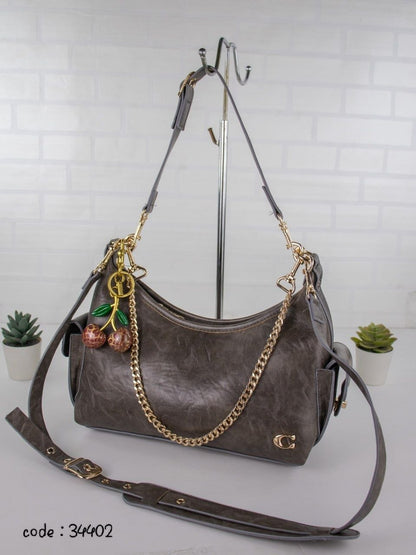 COACH Chic Slouchy Hobo Bag with Cherry Charm