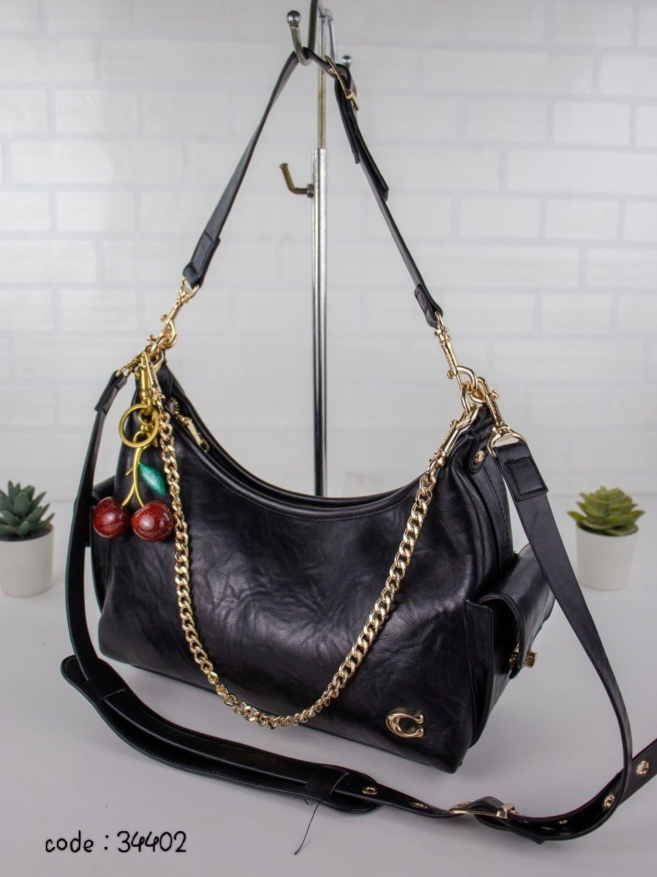 COACH Chic Slouchy Hobo Bag with Cherry Charm
