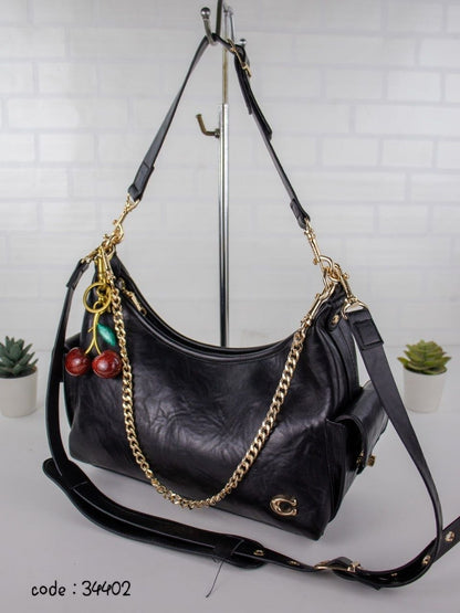 COACH Chic Slouchy Hobo Bag with Cherry Charm