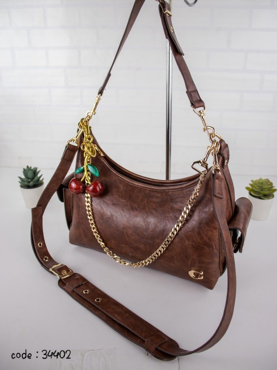 COACH Chic Slouchy Hobo Bag with Cherry Charm