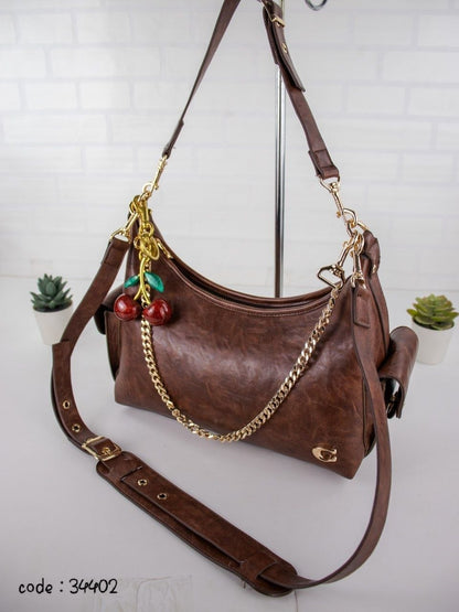 COACH Chic Slouchy Hobo Bag with Cherry Charm