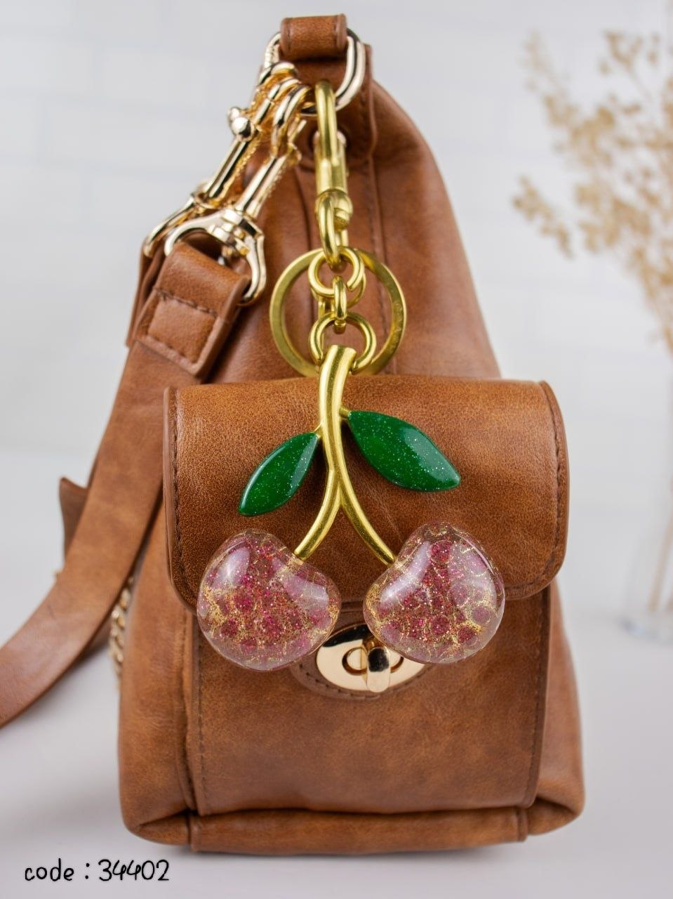 COACH Chic Slouchy Hobo Bag with Cherry Charm