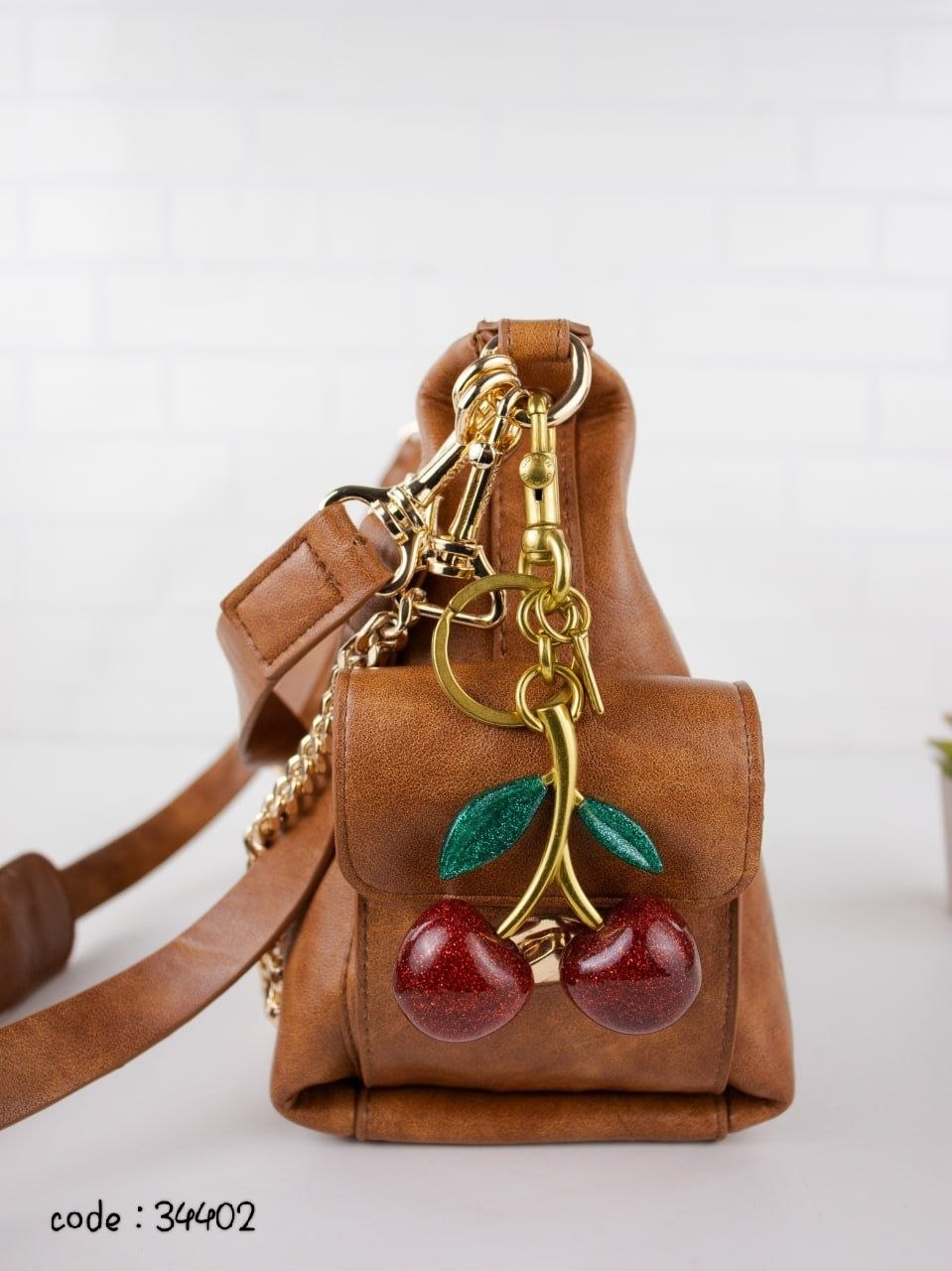 COACH Chic Slouchy Hobo Bag with Cherry Charm