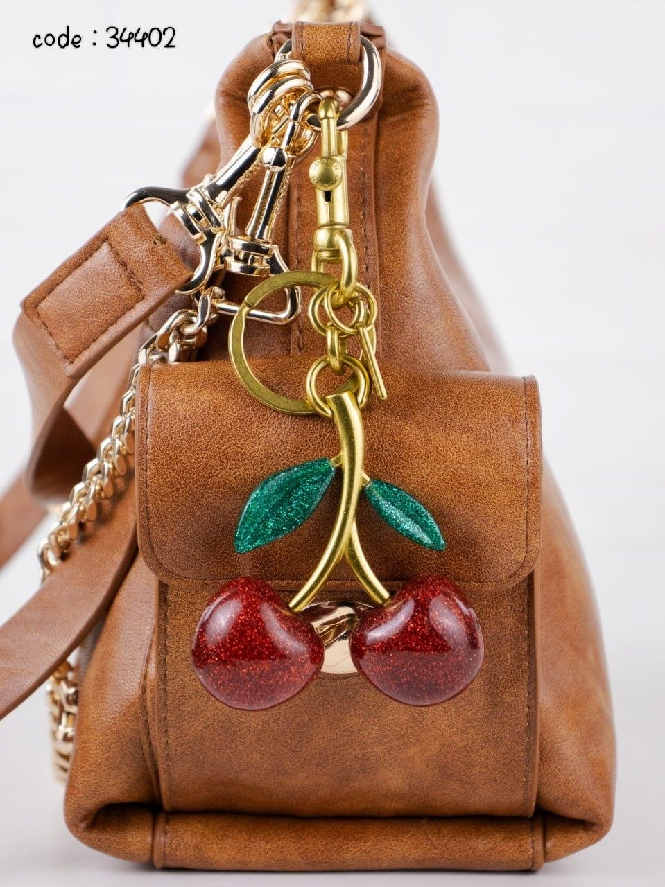 COACH Chic Slouchy Hobo Bag with Cherry Charm